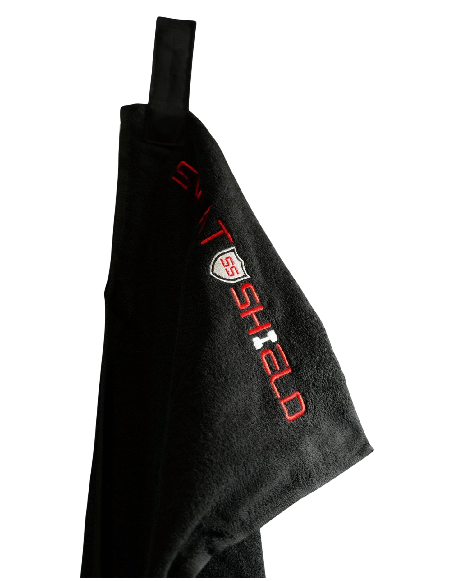 Black towel hangning on a white background